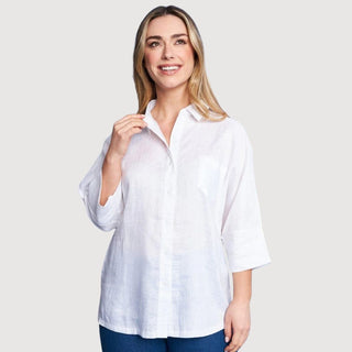 Woman wearing a Dorabella white shirt from Camicie Outlet collection, showcasing classic style and contemporary comfort.