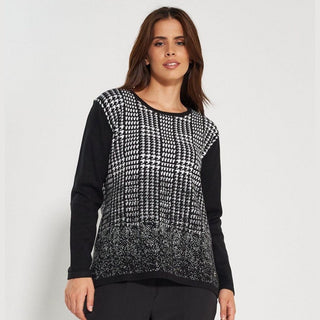 Stylish black and white checkered sweater from Maglieria Outlet, offering chic comfort and affordability for your wardrobe.