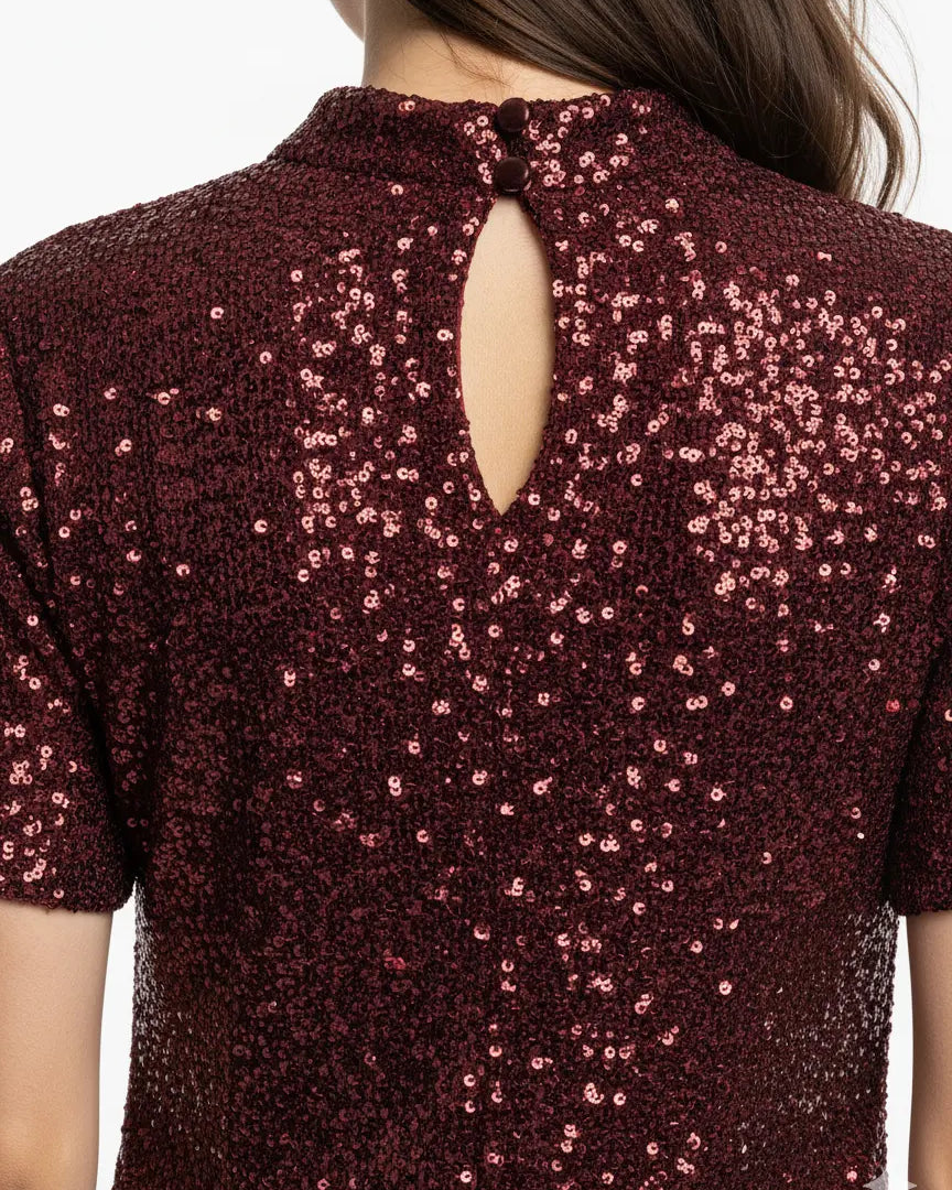 Abito in paillettes con apertura a goccia sul retro IRONICA