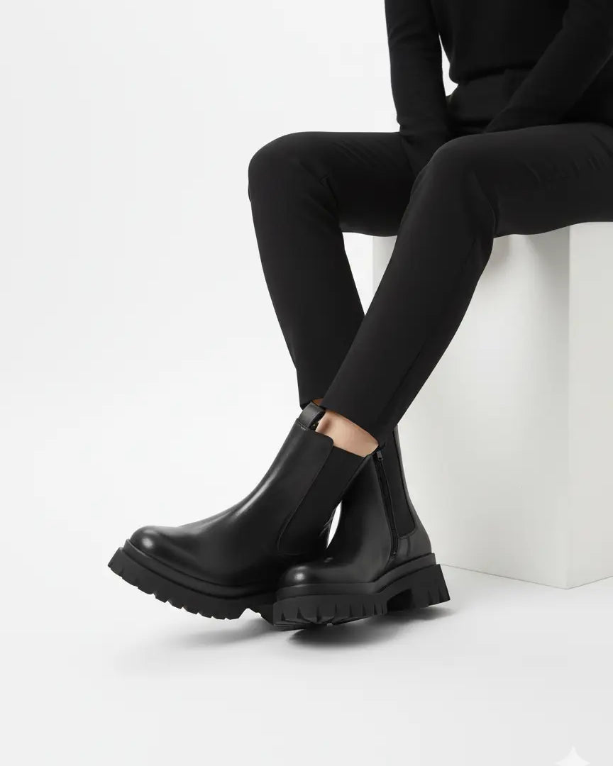 Anfibi con zip laterale e suola alta Dorabella