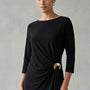 Blusa Ity con accessorio metallico DORABELLA