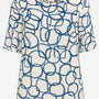 Blusa ampia e lunga in raso stampato a fantasia con accessorio scollo DORABELLA