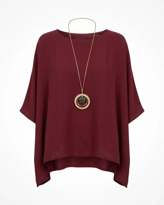 Blusa con fondo sorriso e collana accessorio Unica by Dorabella