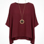 Blusa con fondo sorriso e collana accessorio Unica by Dorabella
