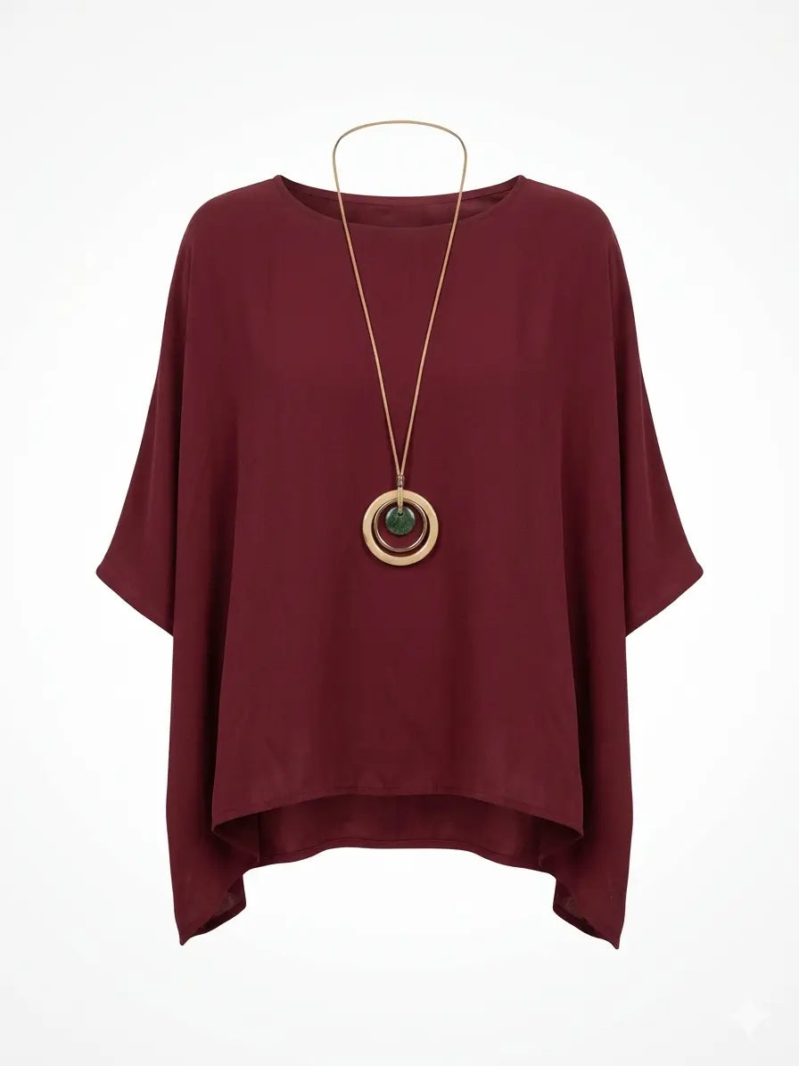 Blusa con fondo sorriso e collana accessorio Unica by Dorabella