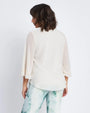 Blusa con scollo a V, fusciacca e manica a volant CREMA DORABELLA