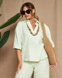 Blusa stile polo in tela di lino e viscosa tinta unita con scollo a V. MENTA DORABELLA