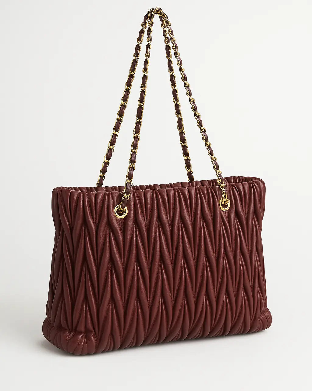 Borsa matelassè con manici in catena Dorabella