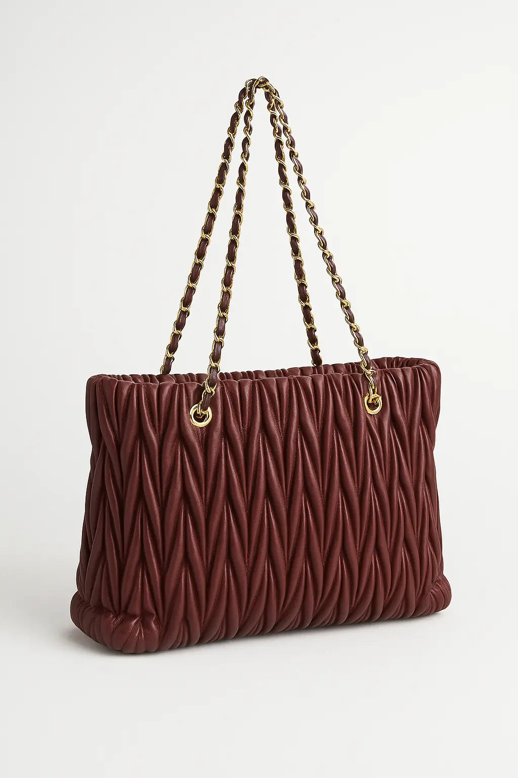 Borsa matelassè con manici in catena Dorabella