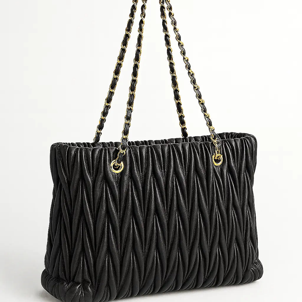 Borsa matelassè con manici in catena Dorabella