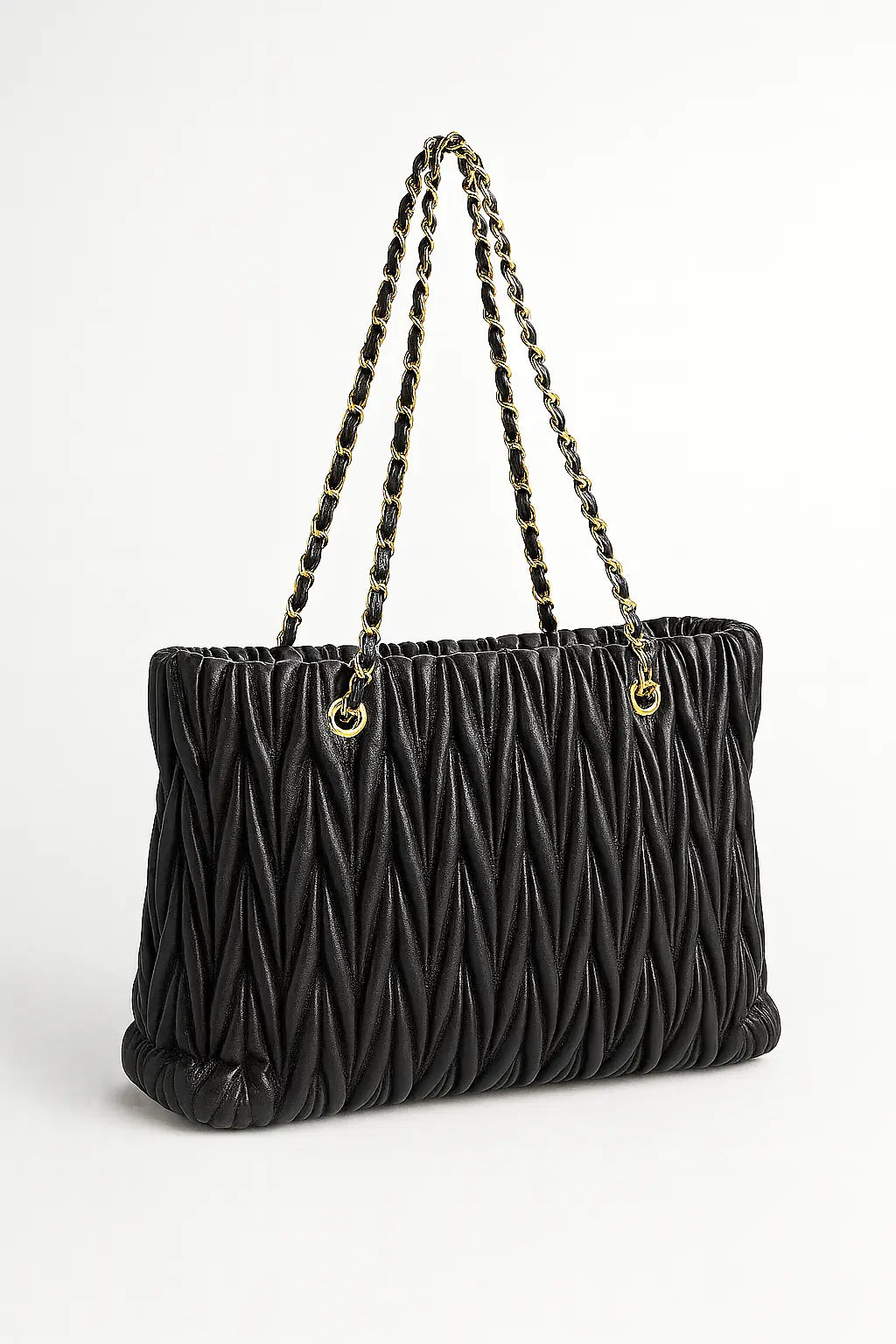 Borsa matelassè con manici in catena Dorabella