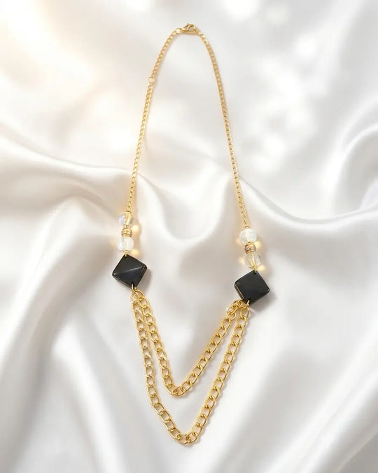 Collana lunga con catena oro light, perline e pietre colorate Dorabella