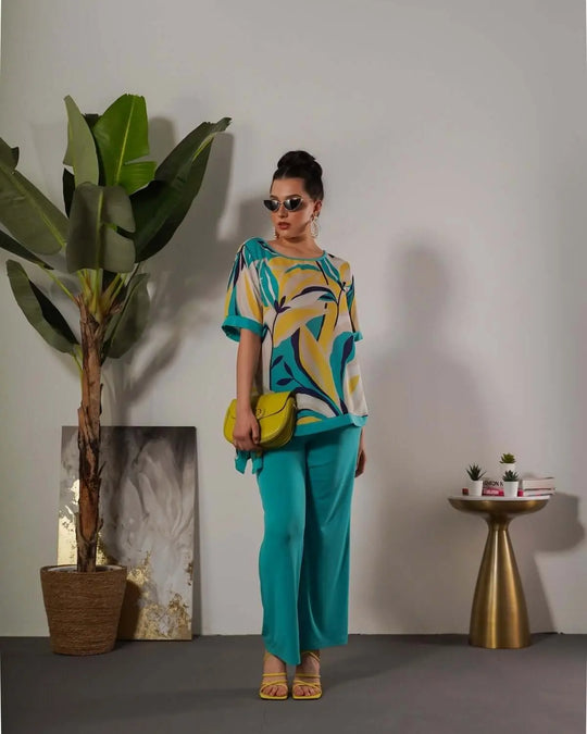 Completo in fantasia floreale con blusa e pantalone ACQUA DORABELLA
