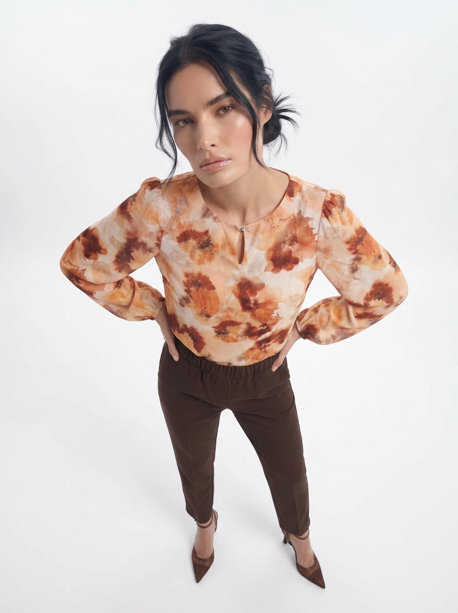 Blusa con goccia accessorio