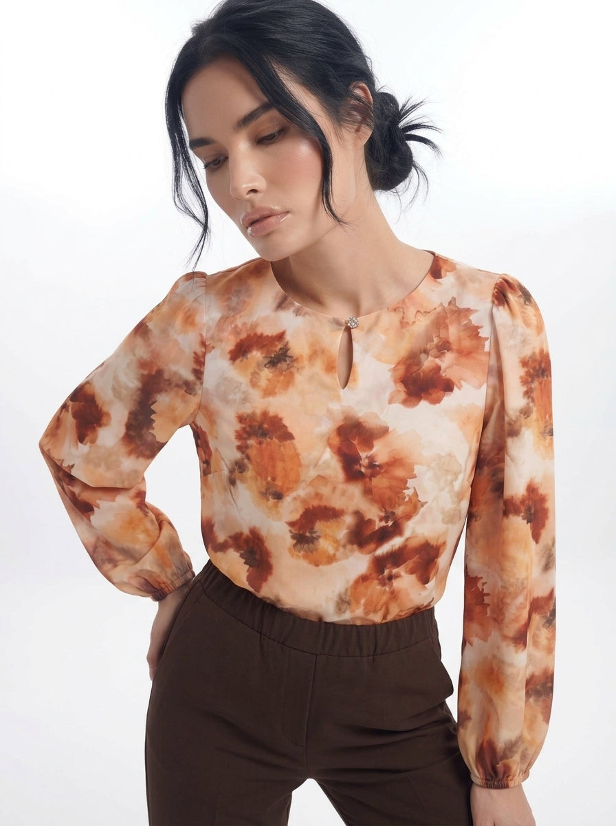 Blusa con goccia accessorio