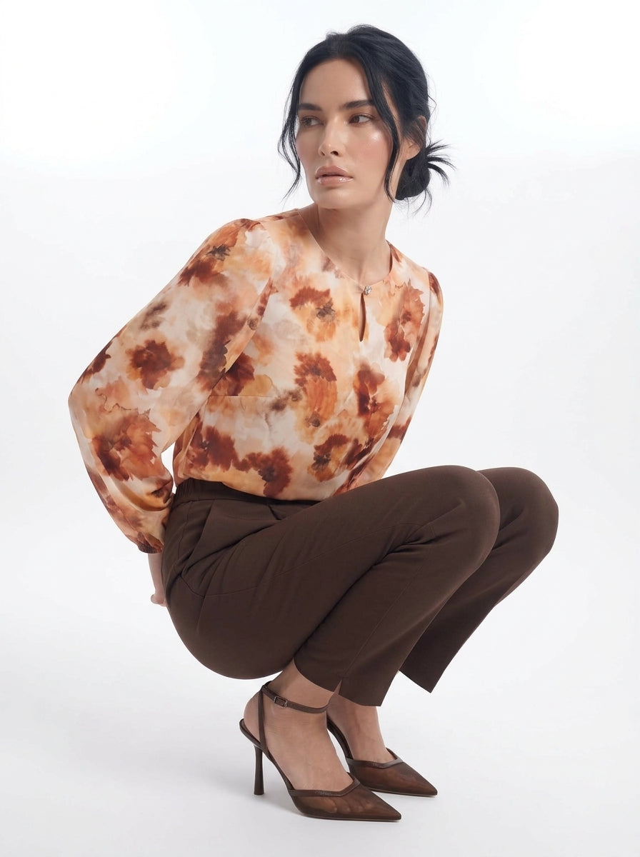 Blusa con goccia accessorio