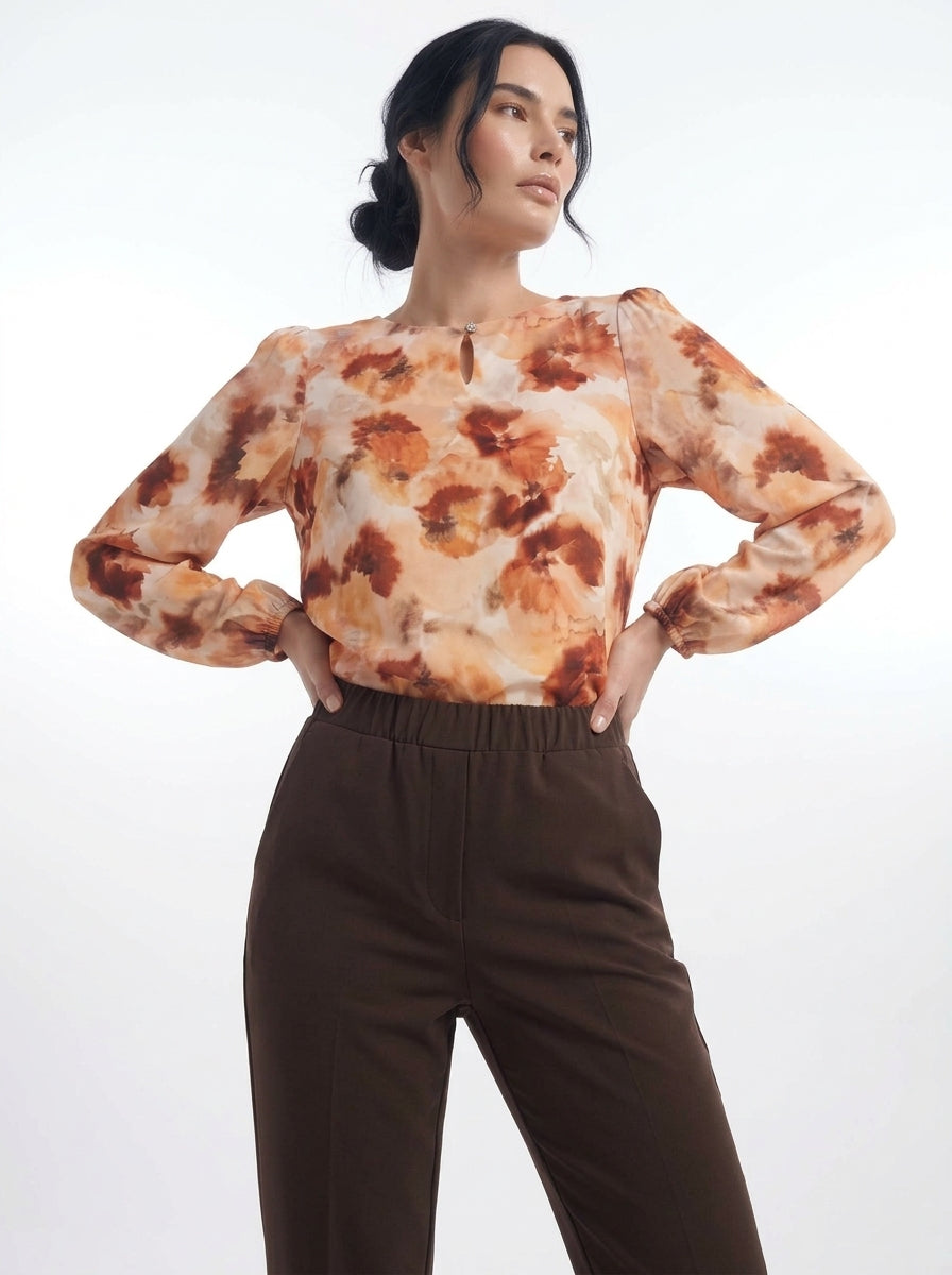 Blusa con goccia accessorio