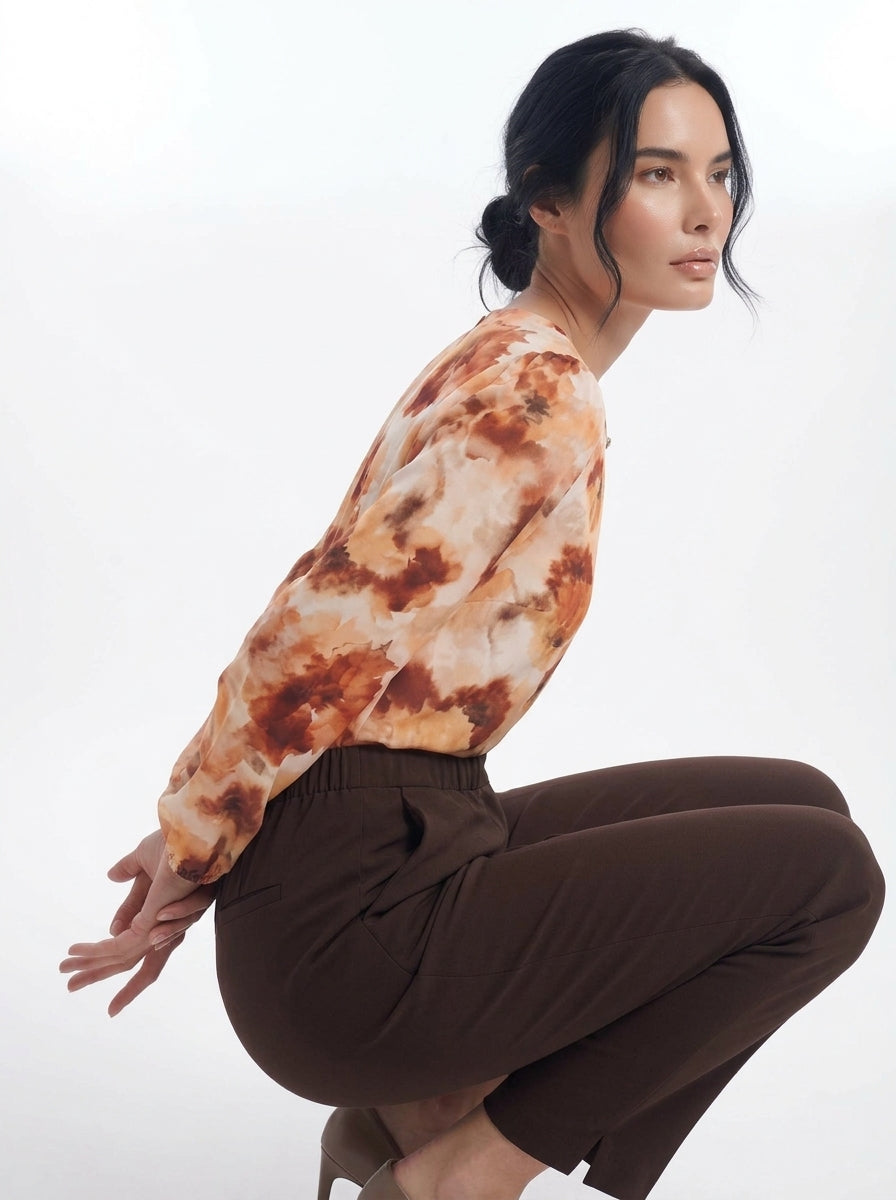 Blusa con goccia accessorio