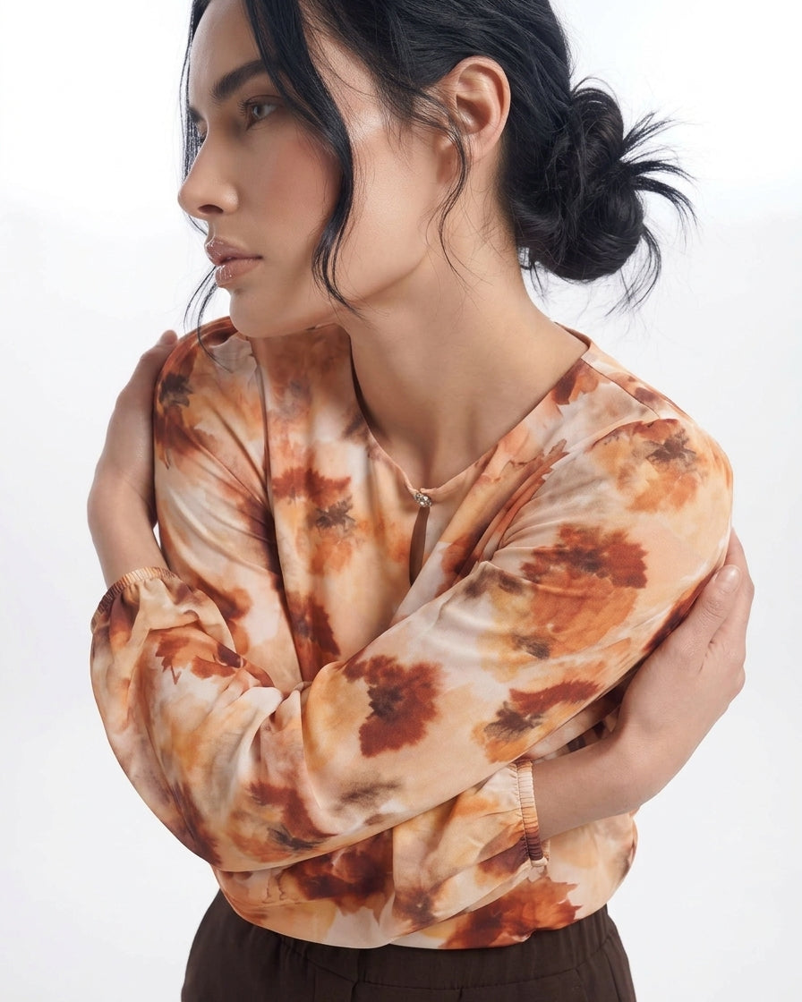 Blusa con goccia accessorio