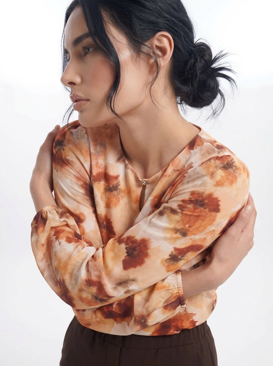 Blusa con goccia accessorio