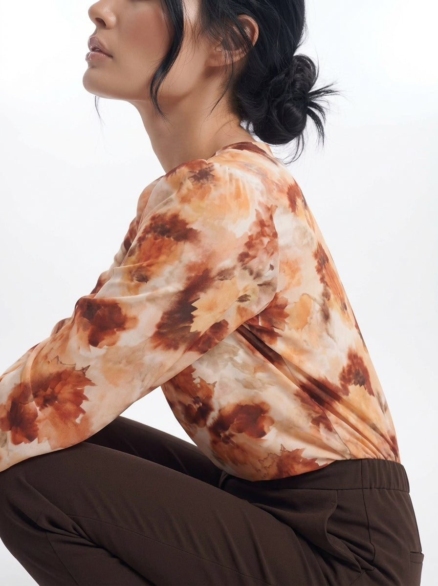 Blusa con goccia accessorio