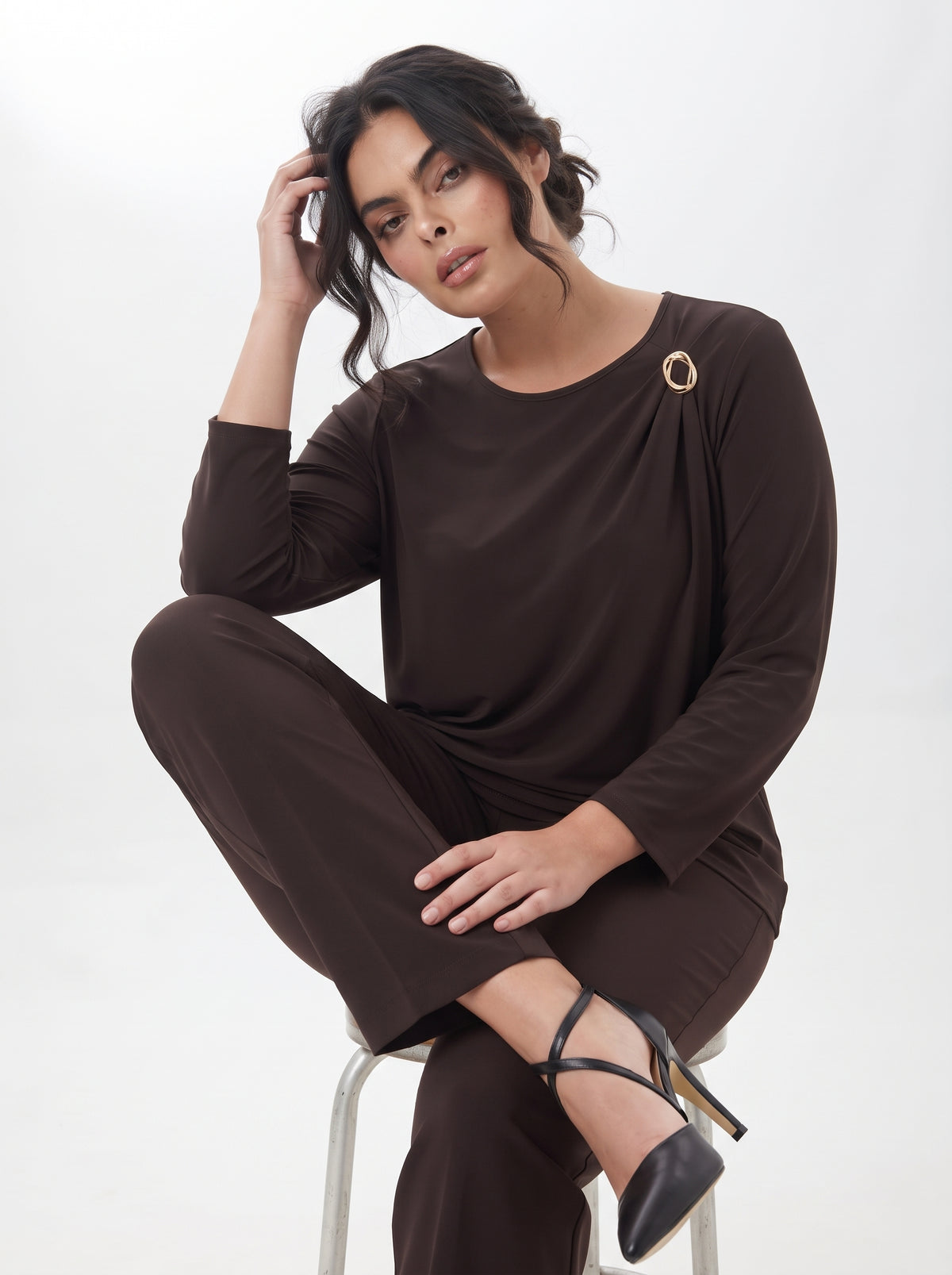 Blusa con accessorio