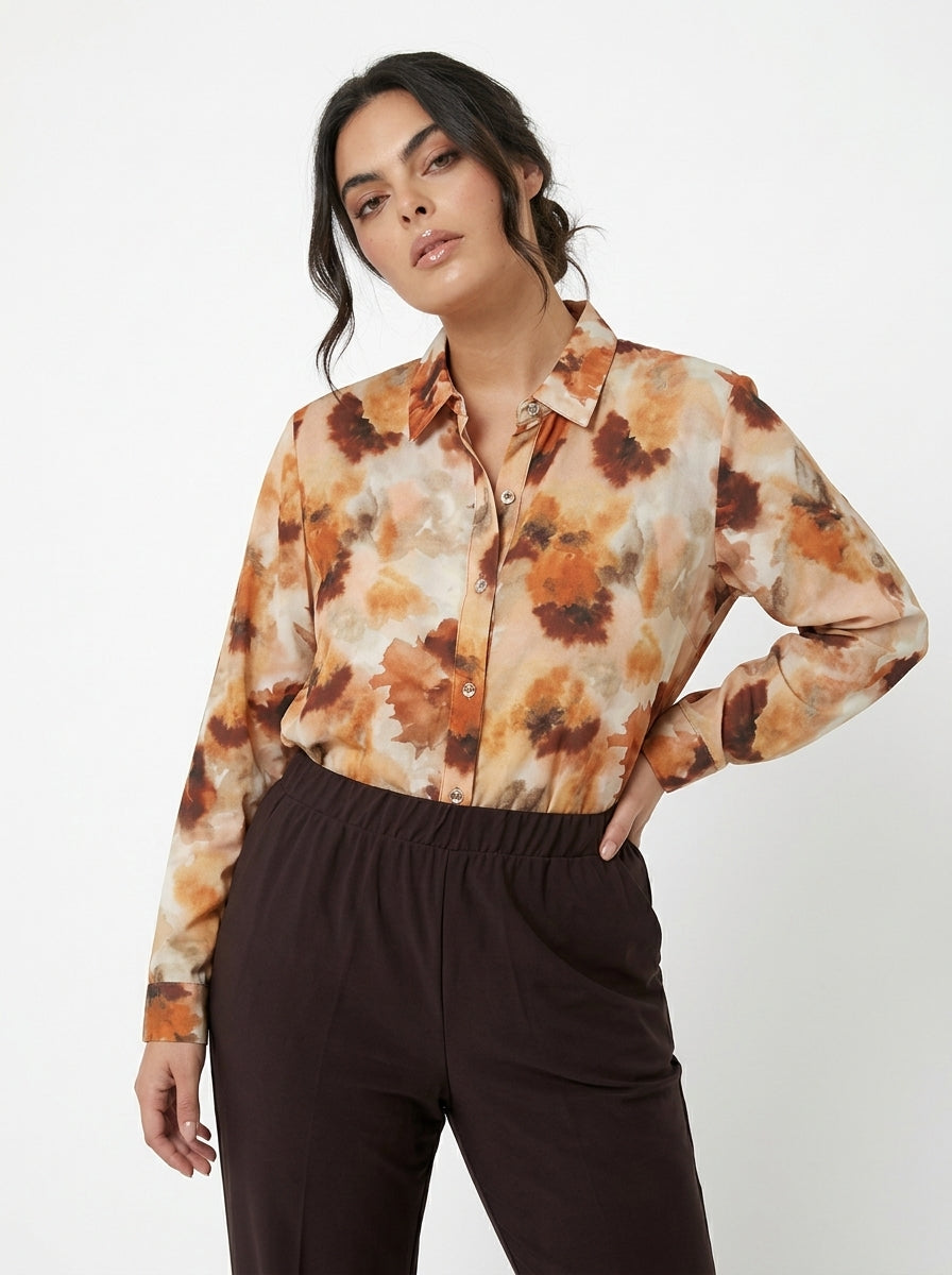 Camicia con taglio peplo