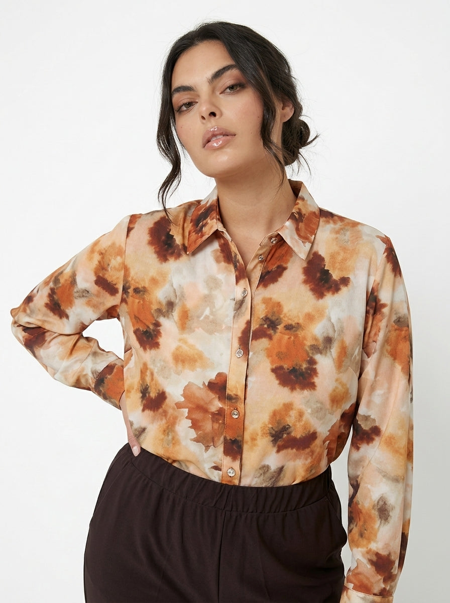 Camicia con taglio peplo