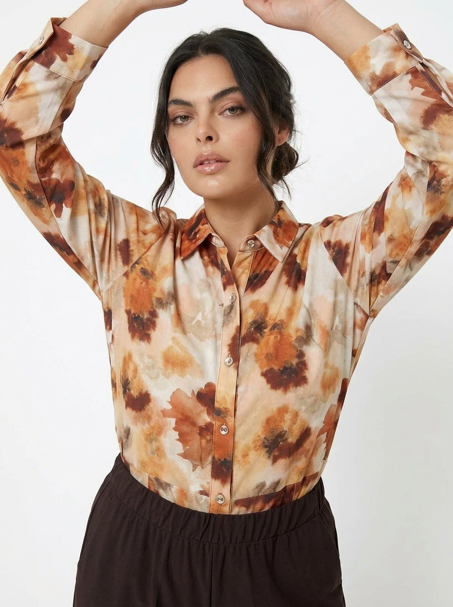 Camicia con taglio peplo