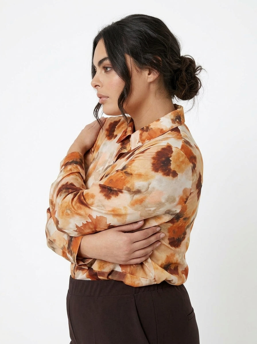 Camicia con taglio peplo