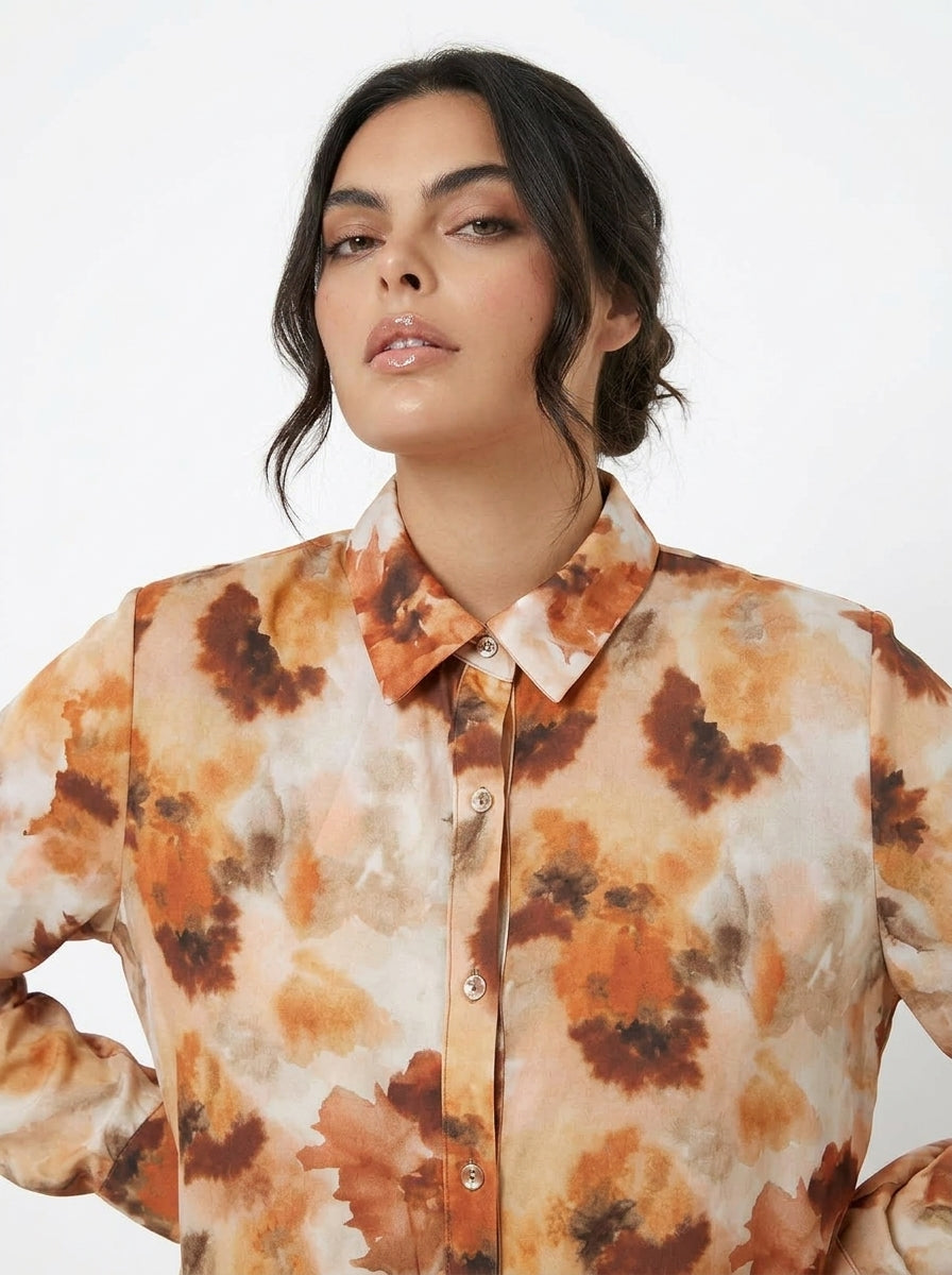 Camicia con taglio peplo
