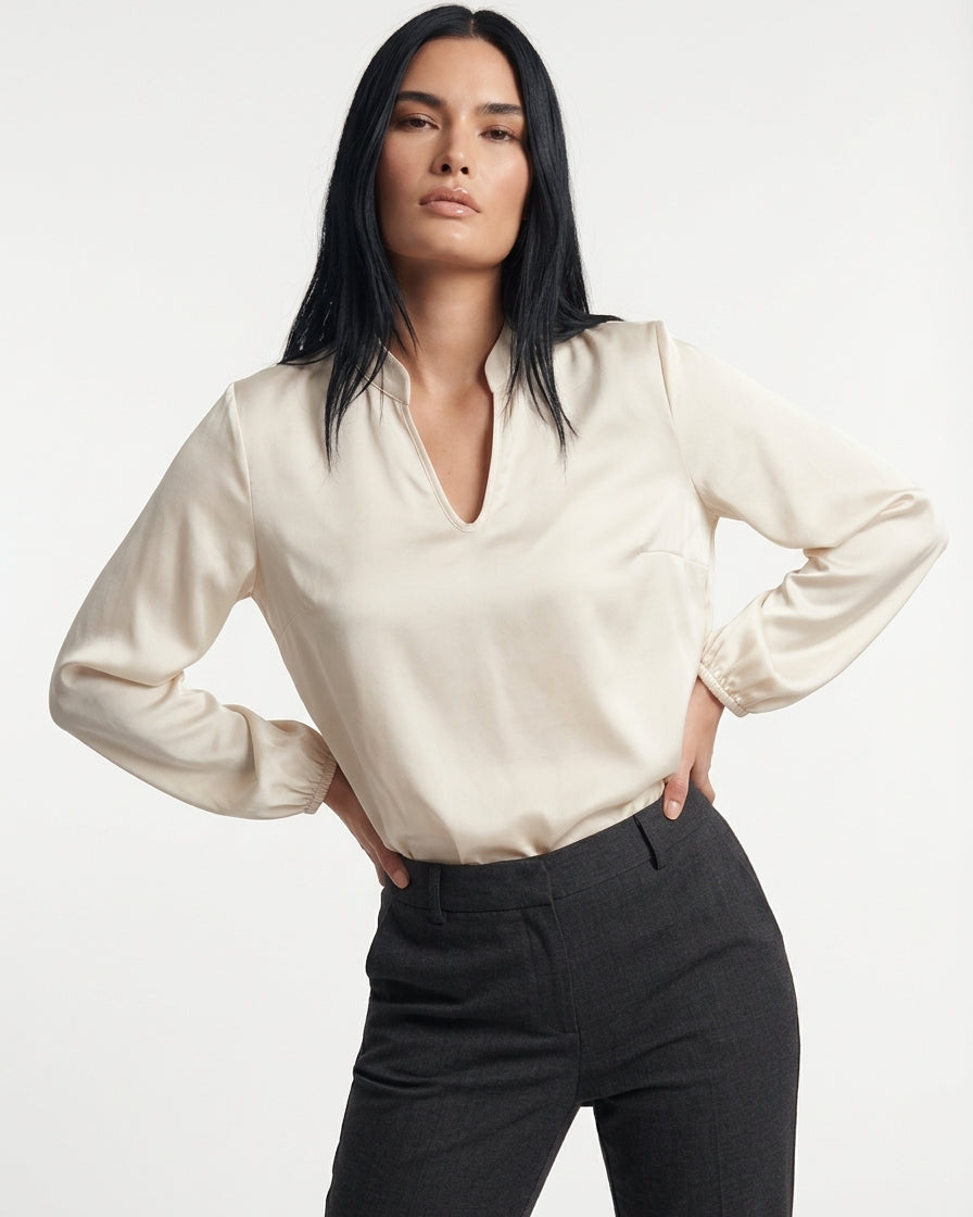 Blusa fluida con scollo a V