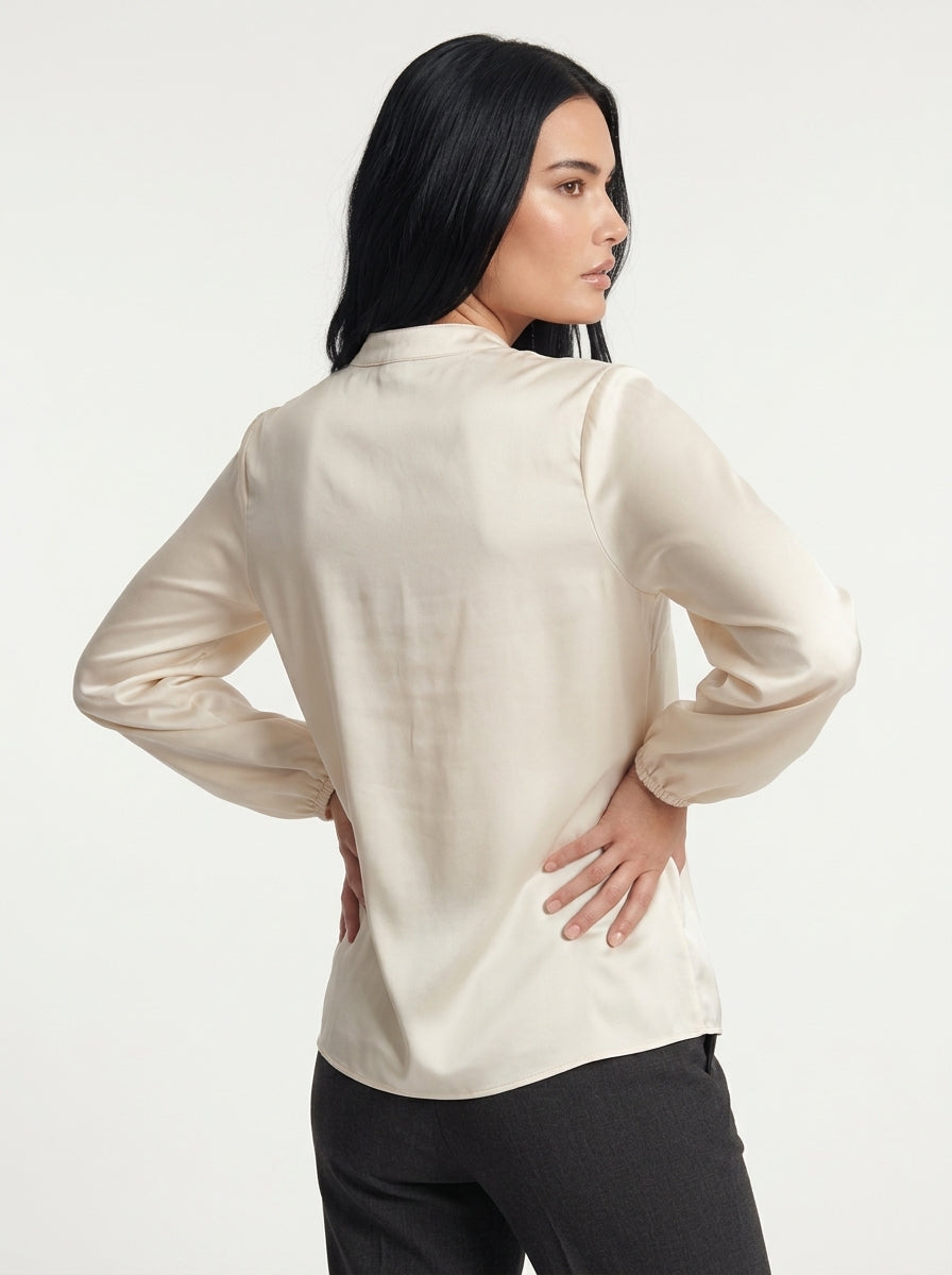 Blusa fluida con scollo a V