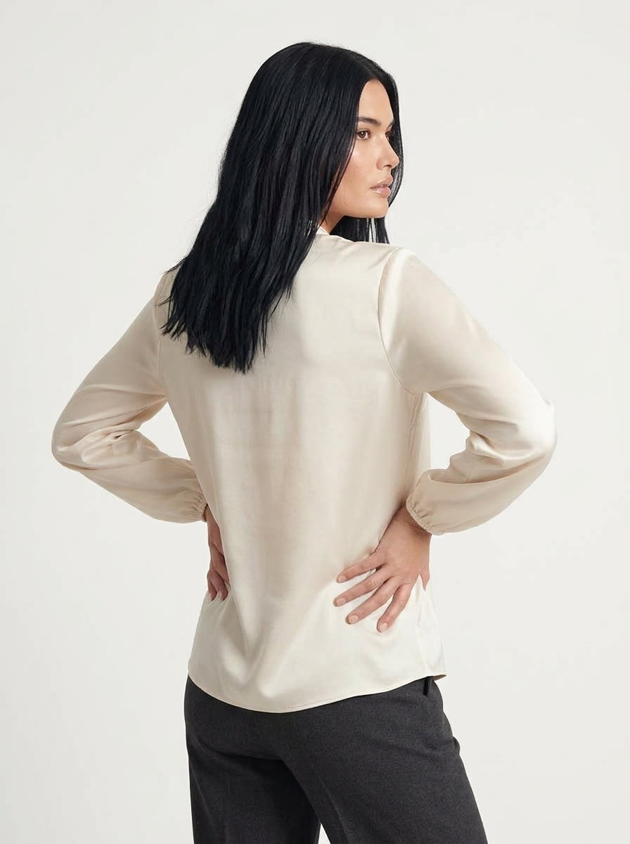 Blusa fluida con scollo a V