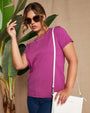Maglia a maniche corte in filato di cotone tinta unita con decorazioni di strass sullo scollo. ORCHIDEA DORABELLA