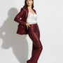 Pantalone a zampa in paillettes IRONICA