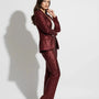 Pantalone a zampa in paillettes IRONICA