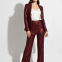 Pantalone a zampa in paillettes IRONICA