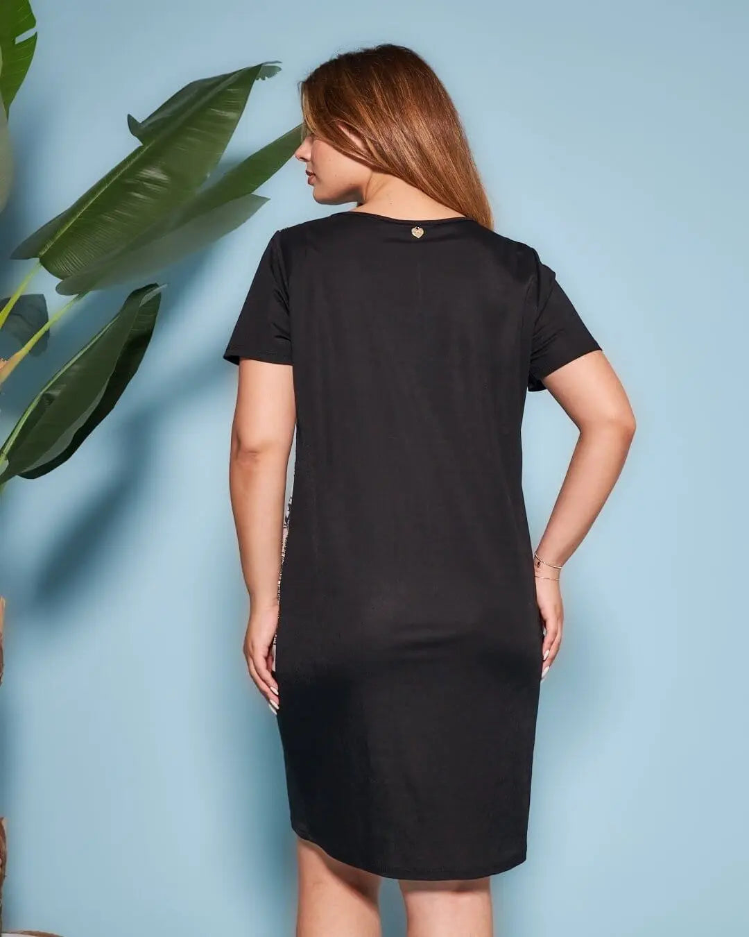 Pantalone capri zampetta in misto viscosa elasticizzata con fantasia a righe jacquard. NERO DORABELLA