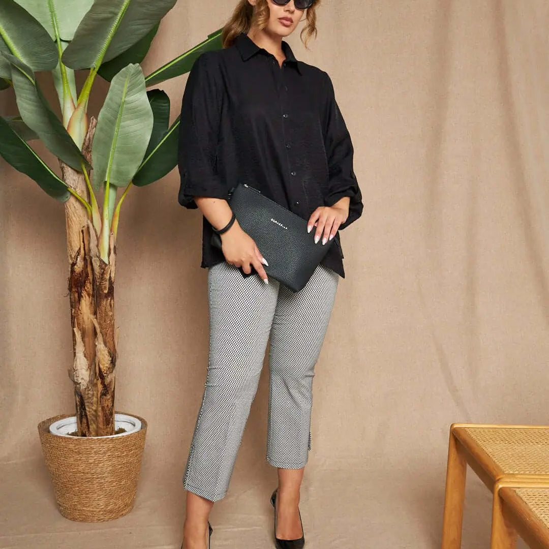 Pantalone capri zampetta in misto viscosa elasticizzata con fantasia maiolica. NERO DORABELLA 50