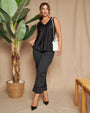 Pantalone gessato a gamba dritta in tela elasticizzata tinta unita con maxi risvolto al fondo. NERO DORABELLA 50