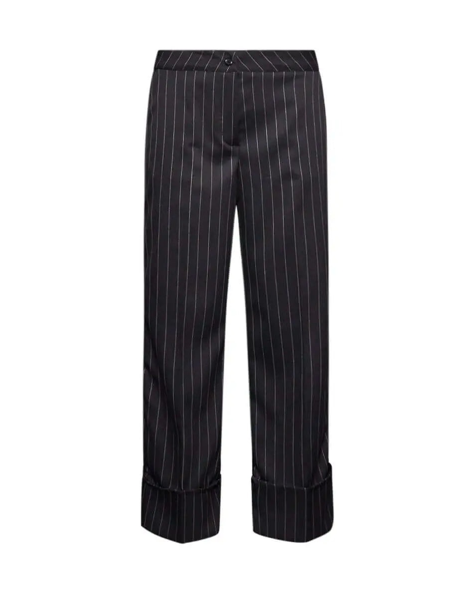 Pantalone gessato a gamba dritta in tela elasticizzata tinta unita con maxi risvolto al fondo. NERO DORABELLA