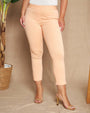 Pantalone skinny capri in jersey di misto cotone elasticizzato tinta unita con dettaglio bottoni. MELONE DORABELLA