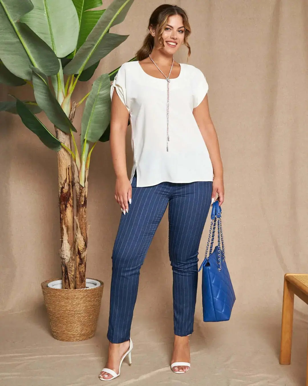 Pantalone skinny in chambray gessato con tasche america e logo D metallico. BLU DORABELLA 50
