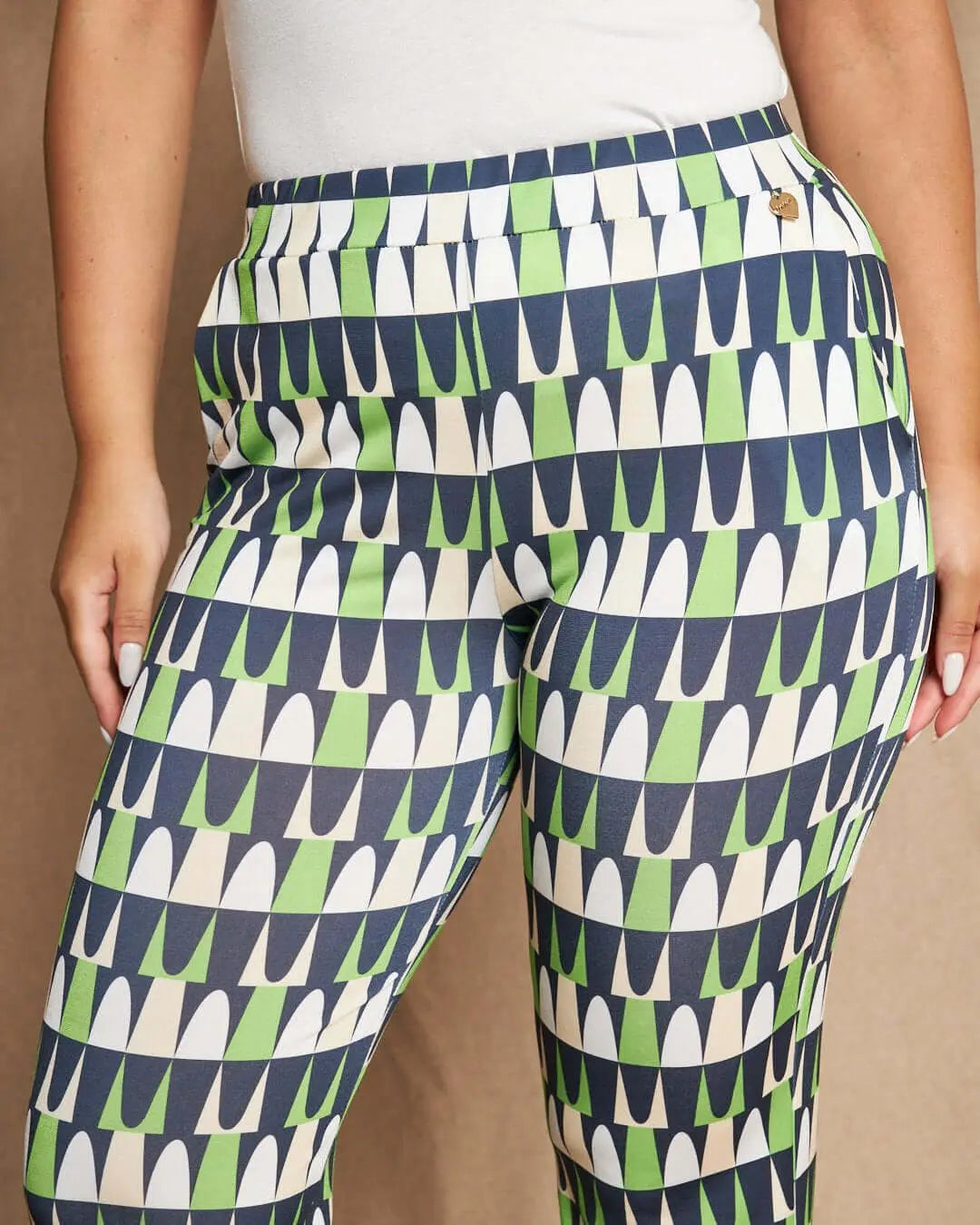 Pantalone zampetta in jersey elasticizzato con fantasia multicolore. MENTA DORABELLA