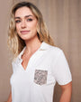 Polo in jersey di viscosa elasticizzata con taschino con borchie fantasia animalier BIANCO DORABELLA XXXL