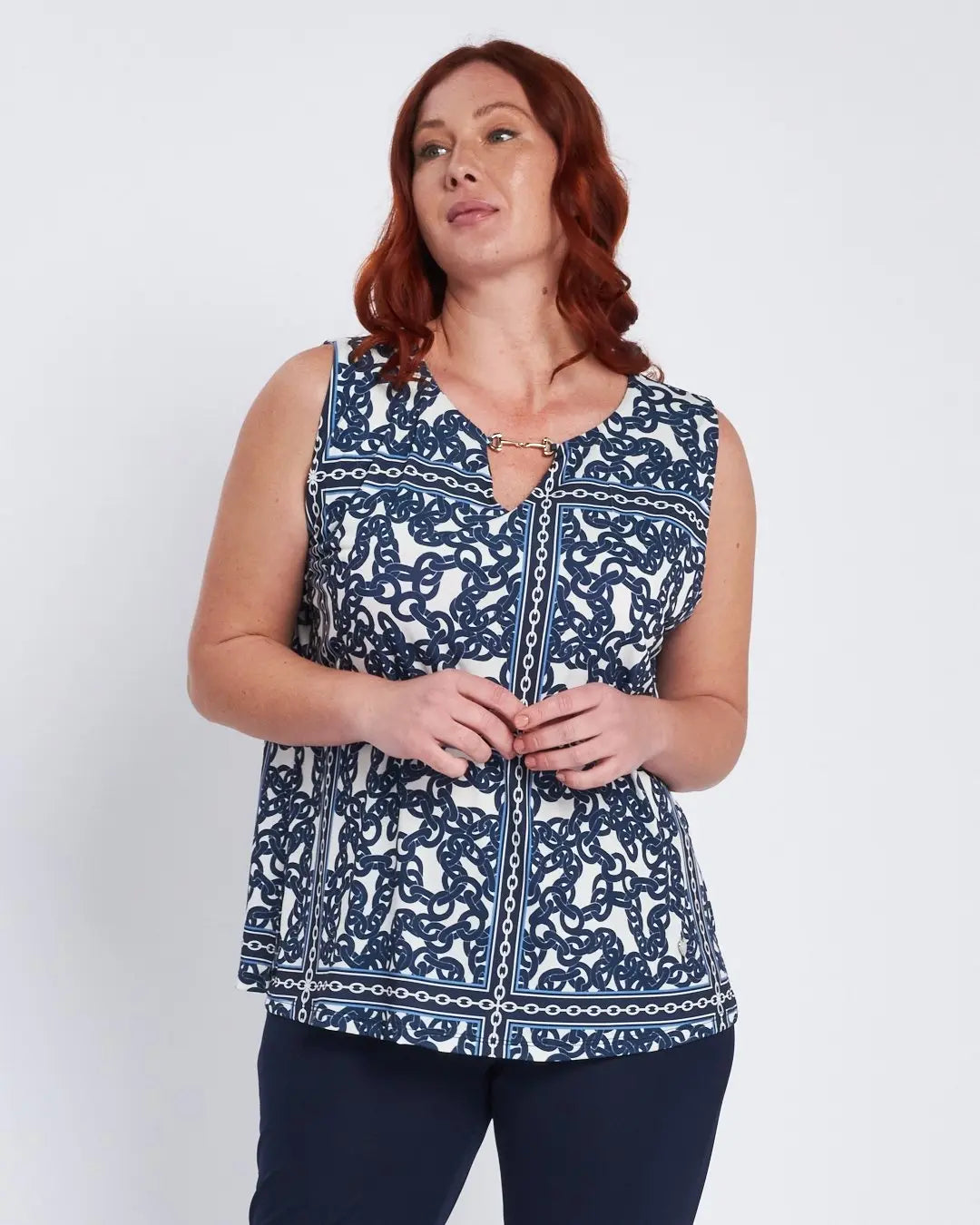 Top con stampa all over e accessorio morsetto BLU DORABELLA PIU' 49