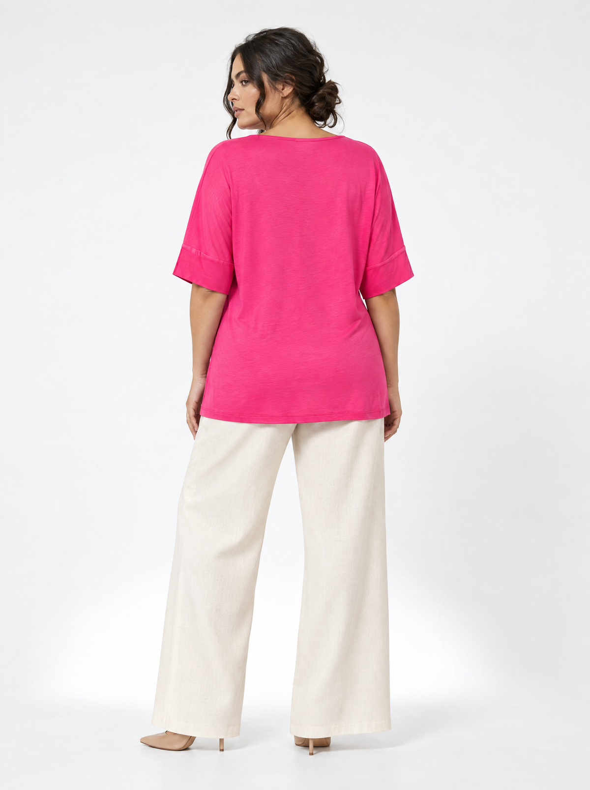 Maglia in filato di viscosa elasticizzata tinta unita con scollo rotondo e maniche kimono. FUXIA - retro